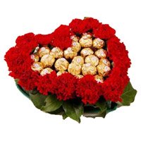 Send Friendship Day Gifts to bangalore with 24 Red Carnation 24 Ferrero Rocher Heart Arrangement