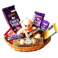 Send Gifts in Bengaluru Online comprising of Exotic Chocolate Basket With 6 Inch Teddy in Bengaluru