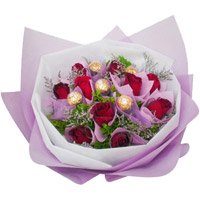 Deliver 12 Red Roses and 5 Ferrero Rocher Bouquet in Bangalore. New Year Gifts Delivery in Bangalore
