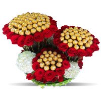 Send Online Diwali Gifts to Bengaluru including 96 Pcs Ferrero Rocher 200 Red White Roses Bouquet