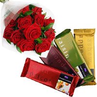 Online Gift of 4 Cadbury Temptation Bars with 12 Red Roses Bunch and Rakhi Flowers to Bangalore