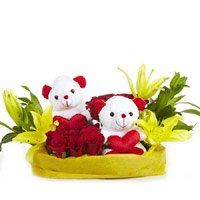 Place Order for Christmas Gifts in Bengaluru to deliver 2 Yellow Lily 12 Red Roses 2 Small Teddy Basket