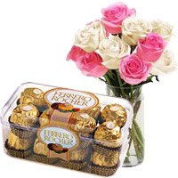 Deliver 10 Pink White Roses in Vase with 16 Pcs Ferrero Rocher Chocolate in Bangalore.  Send Diwali Gifts to Bengaluru
