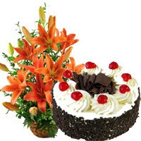 Send Online Gifts to Bengaluru. Order 12 Orange Lily Arrangement 1 Kg Black Forest Cake on Friendship Day
