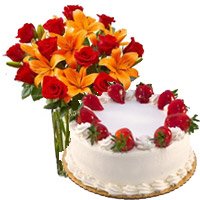 Online Diwali Cakes Delivery in Bangalore. Send 8 Orange Lily 12 Roses Vase 1 Kg Strawberry Cake in Bengaluru from 5 Star Bakery