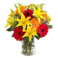 Order Diwali Flowers to Bangalore. Lily Gerbera Bouquet in Vase 12 Flowers in Bangalore