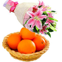 Online Gift Delivery to Bangalore for Pink Lily Bouquet 3 Stems with 12 pcs Fresh Orange fruit to Bangalore