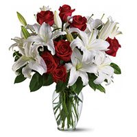 Place Order for Rakhi Flowers to Bangalore. 4 White Lily 12 Red Roses to Bangalore in Vase