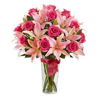 Order Online New Year Flowers in Bangalore for 4 Pink Lily 15 Pink Rose Vase Bangalore
