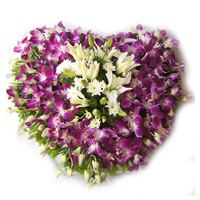 Place order to send 3 White Lily 15 Orchids Heart Arrangement Flowers to Bangalore to your friend on Friendship Day