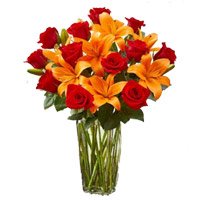 Send 8 Orange Lily 12 Red Roses Flower Vase to Bengaluru for Friendship Day