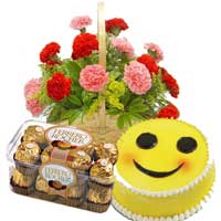 Send 15 Red Pink Carnation Basket, 16 pcs Ferrero Rocher and 1 Kg Smiley Cake in Bangalore