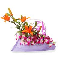 Send 9 Orchids 3 Lily Arrangement. Online Rakhi Flower Delivery in Bangalore