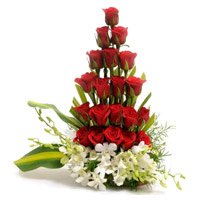 Diwali Flowers to Bengaluru of 4 Orchids 20 Roses Arrangement