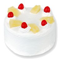 New Year Cakes Delivery in Bangalore with 2 Kg Eggless Pineapple Cake in Bengaluru